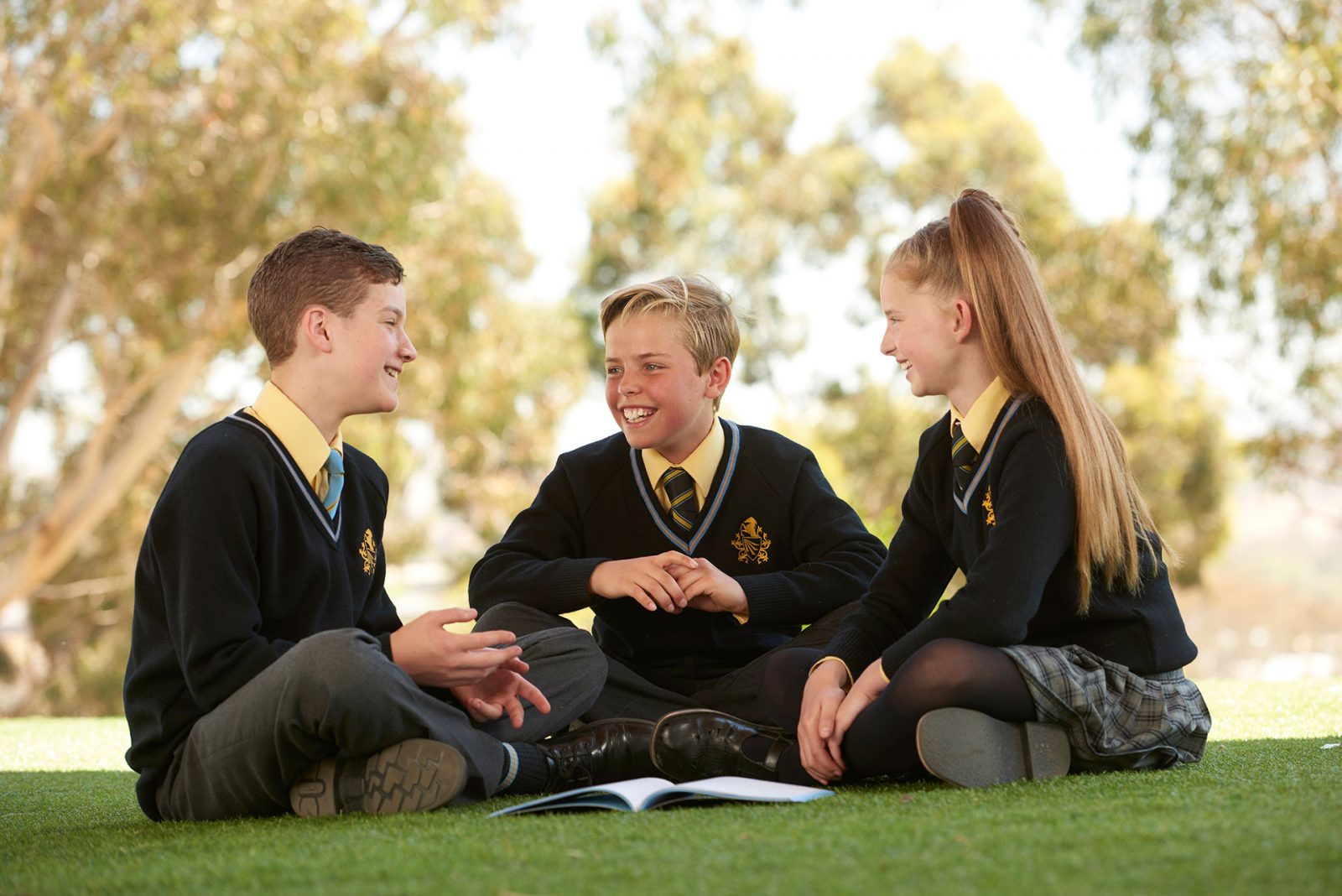 Middle School students studying outdoors