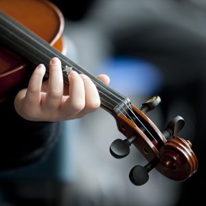 Music Class student playing violin