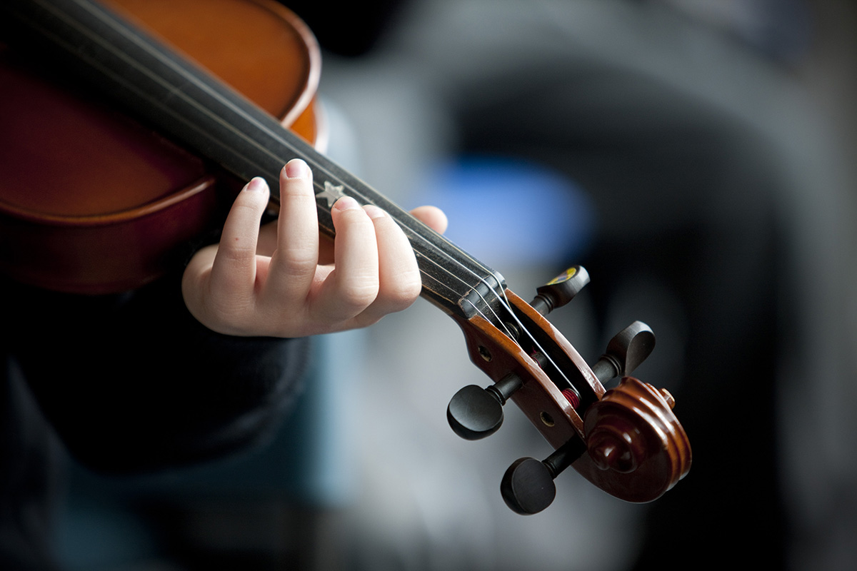 Music Class student playing violin